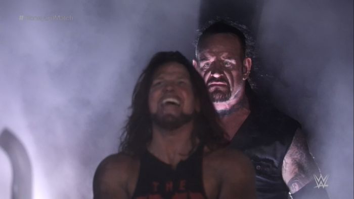 Undertaker Standing Behind Aj Styles